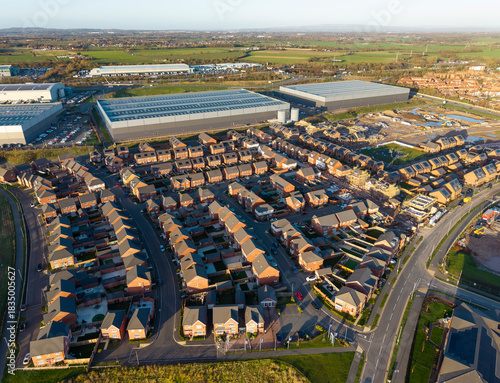 Photos Residential estate beside distribution warehouses, Warrington, England