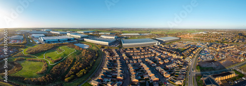 фотографія Panorama of housing estates adjacent to warehouses of a distribution centre, War