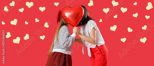 Young lesbian couple kissin...
