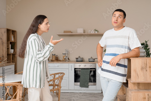 Young woman quarreling with...