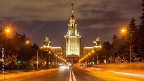 Evening Cityscape: Majestic Architecture Illuminated at Dusk with Traffic Trails and Lanterns