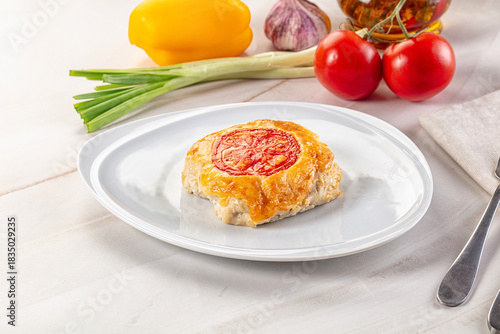 Photos Chicken chop cutlet with cheese and tomato