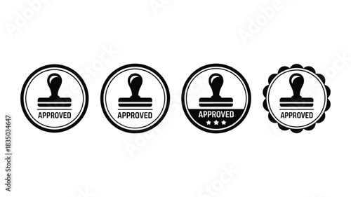 Collection of four different rubber stamps featuring approved and other text in various oval shapes