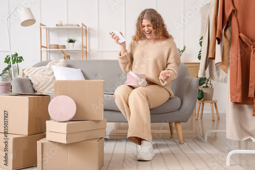 Young woman with mobile pho...