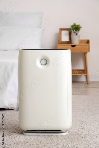 Modern white air purifier i...