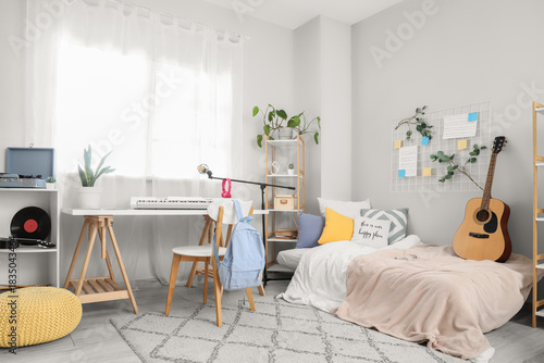 Interior of bedroom with mu...