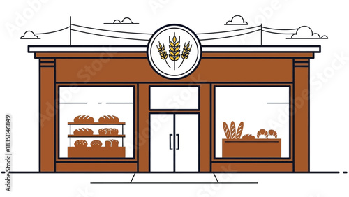 Charming bakery storefront with fresh bread displayed in windows on a sunny day