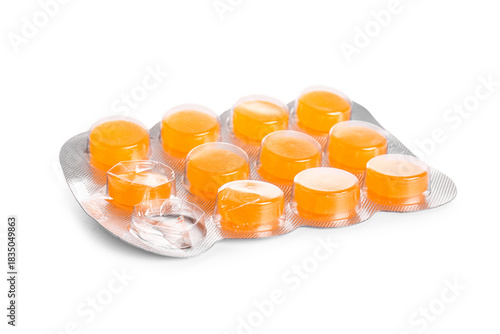 Blister with cough drops on white background