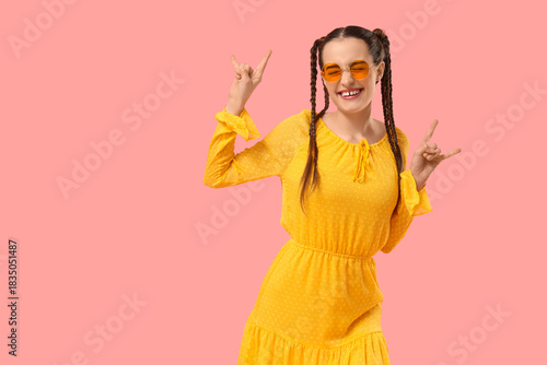 Happy young woman with brai...