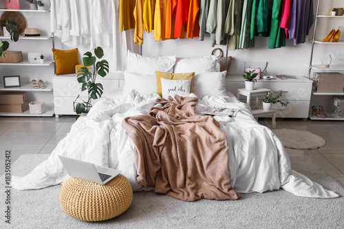 Cozy modern bedroom with wa...