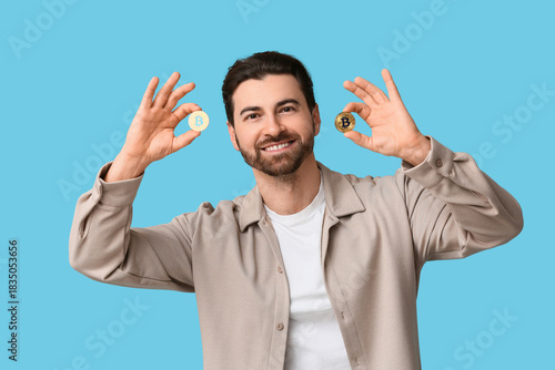 Handsome man with bitcoins ...