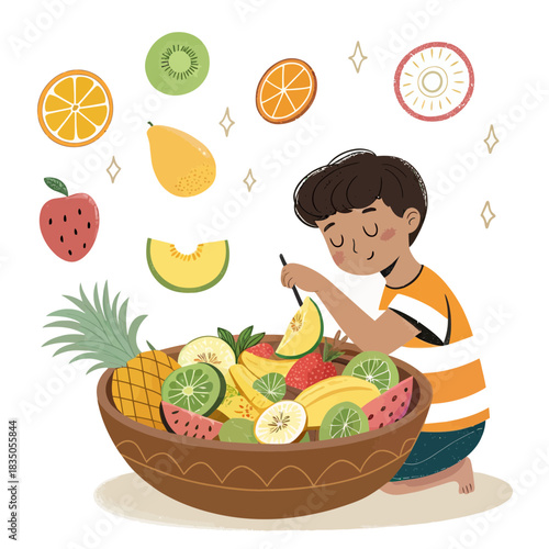 Young boy arranging a colorful bowl of fresh fruit
