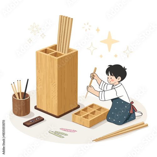 Young boy arranging chopsticks neatly in a holder