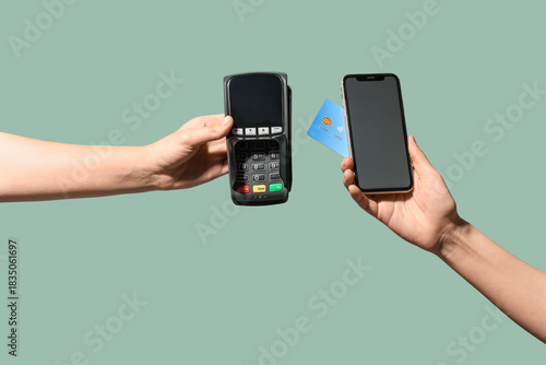 Female hands holding mobile...