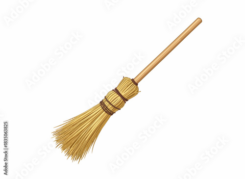 Traditional straw and wood broom for effective sweeping and home cleaning, a classic household utility tool with a natural and rustic design