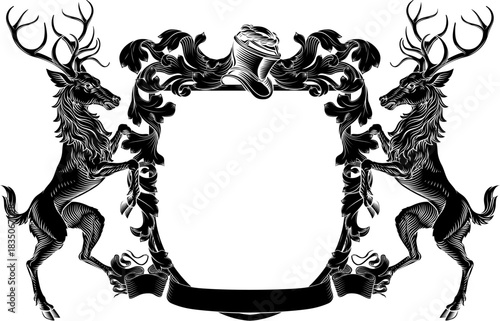 Male deer or stag hart coat of arms or crest family heraldry medieval heraldic knight shield. With helmet and acanthus filigree scroll ornament in a vintage woodcut style.