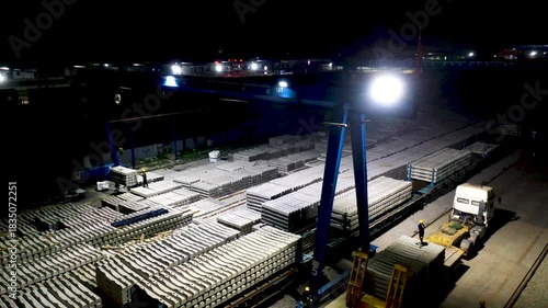 Industrial Construction Materials Warehouse at Night