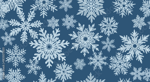 Snowflakes in various shapes on dark blue background, pattern  