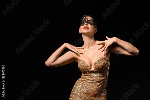 Pretty young woman in golde...
