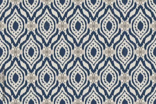 Seamless ethnic Ikat pattern in tribal, folk embroidery, and Mexican style Aztec geometry for Graphic Arts, Carpet Design, Wallpaper, Wrapping, and Clothing.