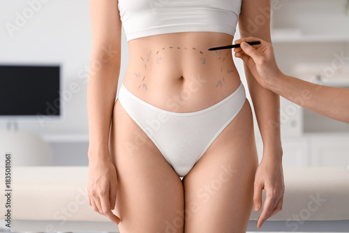 Female plastic surgeon mark...