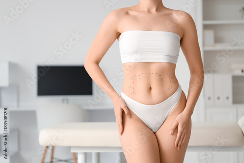 Young woman with marks on h...