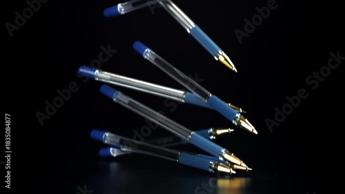 The pens fall on the table. Filmed on a high-speed camera at 1000 fps. High quality FullHD footage
