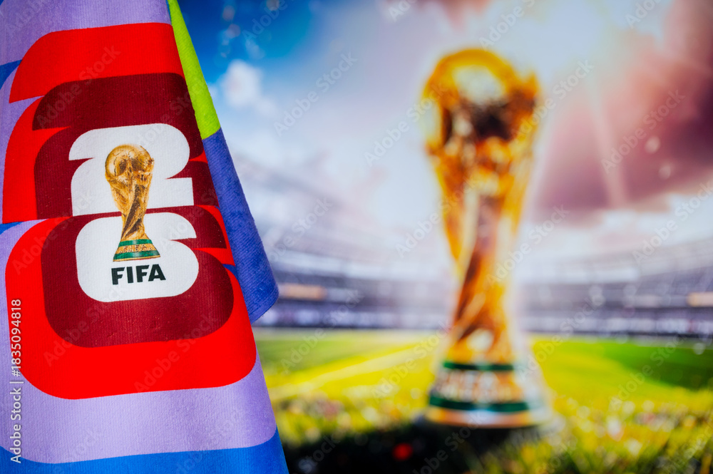 Naklejka premium FIFA World Cup in 2026 background, official logo of World cup in United States, Mexico and Canada and colorful blurred background with gold trophy.