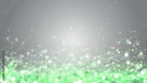 緑のキラキラの光の背景