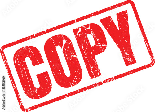 Red copy rubber stamp diagonally placed over white background shows a distressed effect