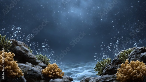 Fototapeta Naklejka Na Ścianę i Meble -  Underwater scene with rocky coral formations and rising bubbles illuminated by subtle light rays in the deep blue sea