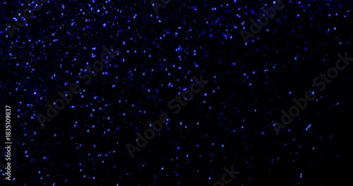 Deep Blue Glitter Texture. Sparkling dark navy blue glitter background with subtle shimmering movement.