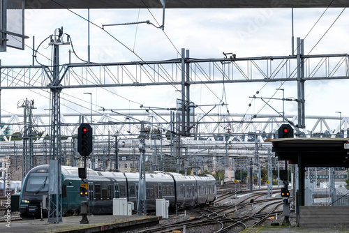 Urban mobility and commute across railway infrastructure and junctions with overhead lines and tracks in the expanding rail network of Oslo Station