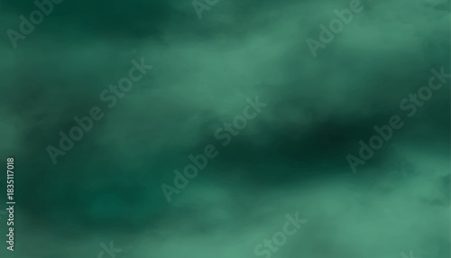Soft focus dark ocean green and black background. Dark teal green moody background with a soft, foggy atmosphere.