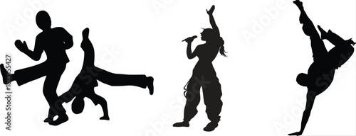 Silhouetted Dancers and Singer Perform Together in Black and White