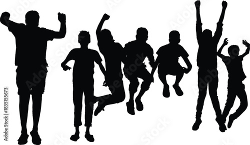 Silhouette of a group of happy children jumping and celebrating together