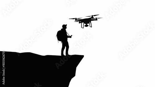 Silhouette of a person controlling a drone on a cliff edge.