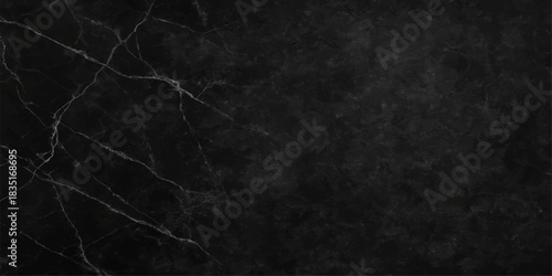 Dark grunge black paper texture with a rough vintage surface and textured gray wallpaper backdrop