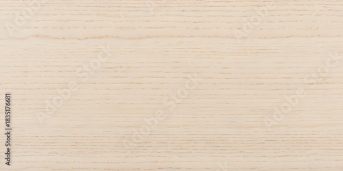 Close-up texture of light-colored wood grain, showcasing fine, parallel lines and a smooth, natural surface with subtle variations in tone, perfect for backgrounds and design elements