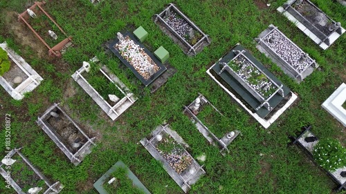 Aerial Overhead Cemetery Graves Tombstones Green Grass Background Concept.