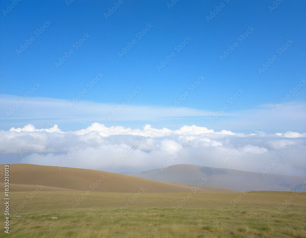 Fototapeta premium Expansive Sky Over Distant Plateau