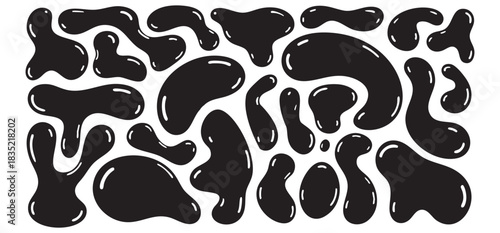 A set of black ink blots. A collection of vector splash elements.
