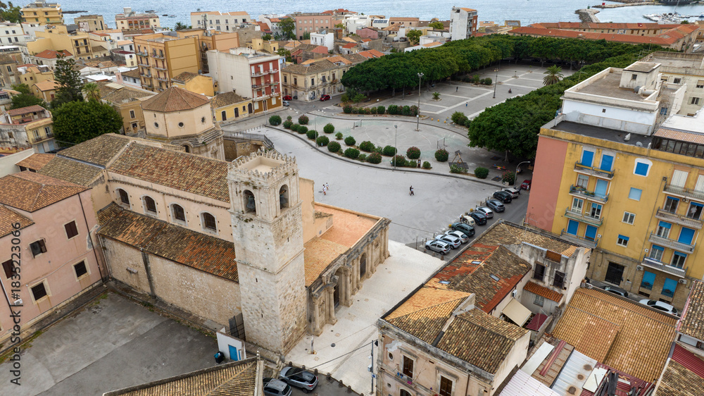 Fototapeta premium Aerial view of the Santuario di Santa Lucia al Sepolcro, in Syracuse, Sicily, Italy. It's a Catholic church built on the site where Saint Lucy was martyred. It's located in the square of the same name