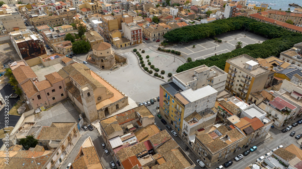 Fototapeta premium Aerial view of the Santuario di Santa Lucia al Sepolcro, in Syracuse, Sicily, Italy. It's a Catholic church built on the site where Saint Lucy was martyred. It's located in the square of the same name