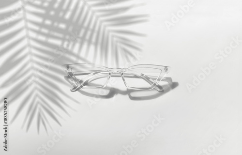 Summer sunglasses on a pink background. New trending colour of the 2026 year 