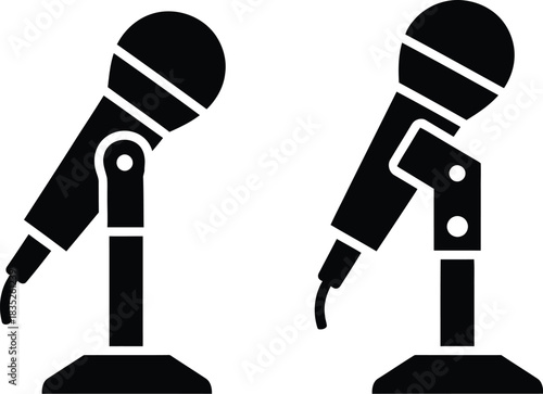 Two microphones on stands black silhouette for performance or recording