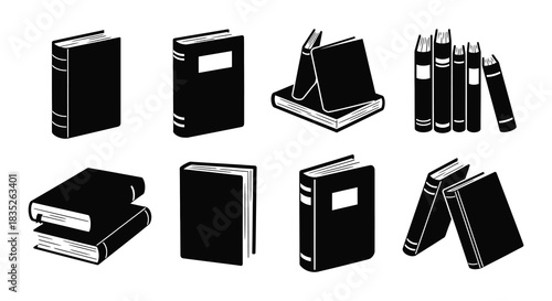 A collection of black and white book icons in various orientations