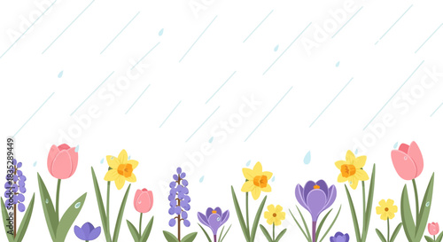 Delicate spring flowers blooming during a soft rain shower create a peaceful scene