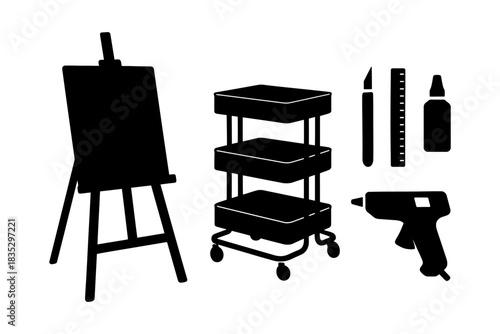 Art studio equipment silhouette: easel, cart, craft tools, ruler, glue gun.