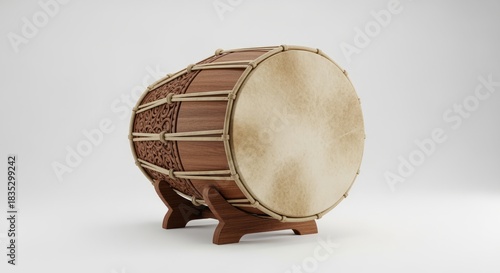 Traditional Wooden Drum With Intricate Carvings On A White Background
